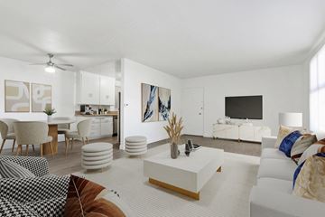 Beverly Hills apartment for rent - A living room with a white couch and a coffee table.