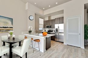 Los Angeles apartment for rent - A modern kitchen with a dining table and chairs.