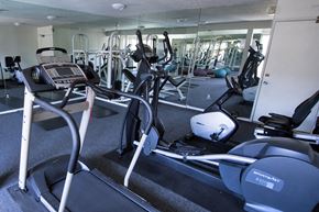 Sherman Oaks apartment for rent - A gym with treadmills, elliptical machines, and other exercise equipment.