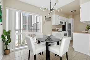 Los Angeles apartment for rent - A dining room with a table and chairs.