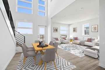 San Pedro apartment for rent - A modern living room with a dining table and chairs.