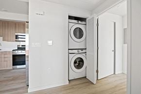 San Pedro apartment for rent - A white washing machine is in a white doorway.
