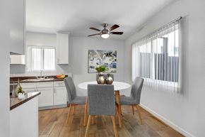 Los Angeles apartment for rent - A kitchen with a dining table and chairs.