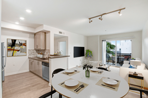 Los Angeles apartment for rent - A modern kitchen with a dining table set for two.at Vues on Gordon, Los Angeles, CA 90028 