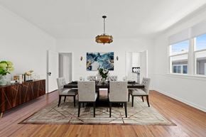 Los Angeles apartment for rent - a dining room with a large table and chairs and a rug