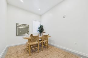 Los Angeles apartment for rent - A dining room with a table and chairs.