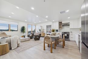 Los Angeles apartment for rent - A modern kitchen with a dining table and chairs.