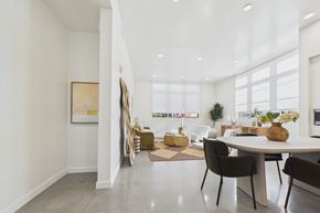 Los Angeles apartment for rent - A dining room with a white table and chairs.