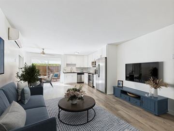 Los Angeles apartment for rent - A modern living room with a grey sofa and a coffee table.