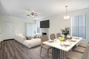 Redlands apartment for rent - A dining room with a white table and chairs.