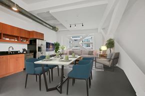 Los Angeles apartment for rent - A modern kitchen with a dining table and chairs.