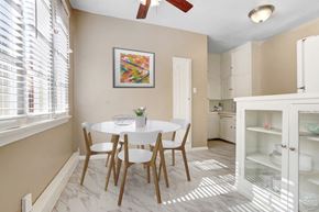 Los Angeles apartment for rent - a dining room with a white table and chairs