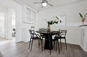 Los Angeles apartment for rent - A dining room with a table set for six.
