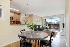 Northridge apartment for rent - A dining room with a table and chairs.