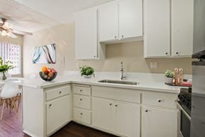 Torrance apartment for rent - Kitchen With a single sink, small breakfast bar, stainless steel refrigerator