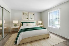 Winnetka apartment for rent - a bedroom with a bed and a window
