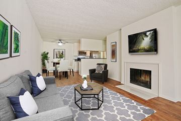 Los Angeles apartment for rent - A living room with a grey couch and a coffee table.