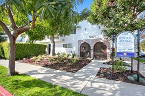 Los Angeles apartment for rent - A white building with a sign that says Federal Avenue in front of it.