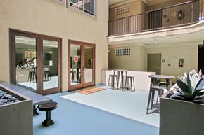 Los Angeles apartment for rent - A large open space with tables and chairs.