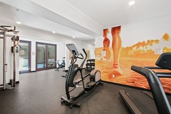 High tech fitness center with flat screen tv