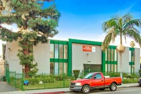 Panorama City apartment for rent - a red truck parked in front of a green and white building