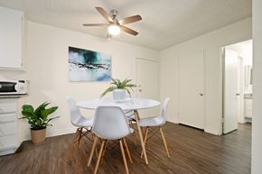 Los Angeles apartment for rent - A dining room with a white table and chairs.