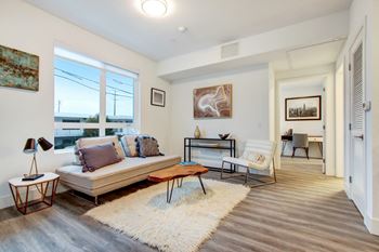 Spacious living room accented by lofty 9-foot ceilings