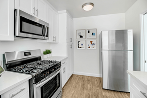 Studio City apartment for rent - a kitchen with stainless steel appliances and a refrigerator