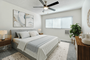 Studio City apartment for rent - a bedroom with a bed and a ceiling fan