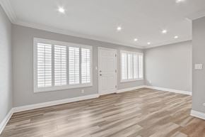 Studio City apartment for rent - A room with wooden flooring and white walls.
