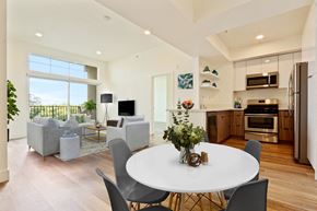 Los Angeles apartment for rent - A modern kitchen with a dining table and chairs.