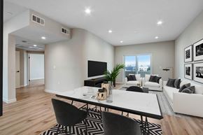 Valley Village apartment for rent - a living room with white walls and hardwood floors