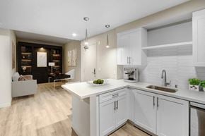 Los Angeles apartment for rent - a kitchen with white cabinets and a white counter top