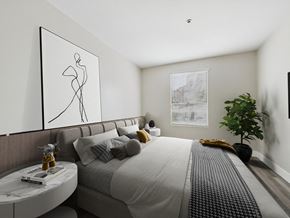 Hancock Park apartment for rent - A modern bedroom with a large bed and a framed abstract art piece on the wall.