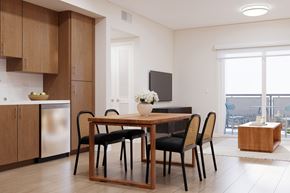 Canoga Park apartment for rent - A modern dining room with a wooden table and chairs.