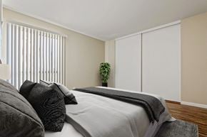 Los Angeles apartment for rent - a bedroom with a large bed and a window