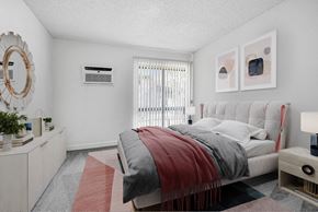 Tarzana apartment for rent - a bedroom with a bed and a window
