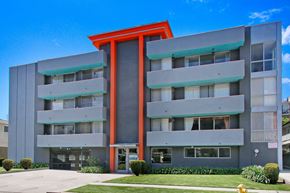 Los Angeles apartment for rent - an apartment building with an orange and gray facade