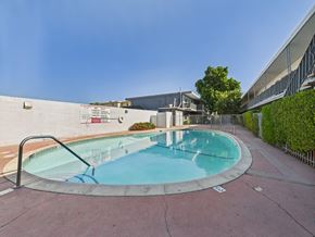 Canoga Park apartment for rent - A round pool with a metal railing around it.