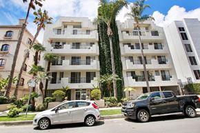 Los Angeles apartment for rent - a white car parked in front of a building