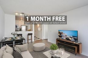 Los Angeles apartment for rent - A living room with a flat screen TV on a wooden stand.