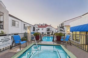 Burbank apartment for rent - A pool with a sign that says spa rules.