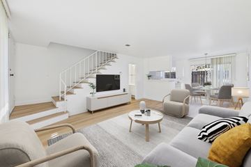 Thousand Oaks apartment for rent - A living room with a grey couch and a coffee table.