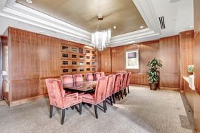 Los Angeles apartment for rent - a dining room with a table and chairs and a chandelier