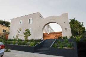 Los Angeles apartment for rent - a building with an arch and stairs in front of it