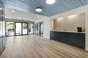 Northridge apartment for rent - a lobby with a blue ceiling and wood flooring
