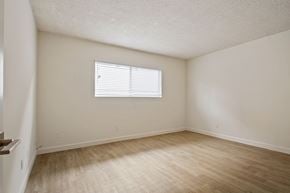Los Angeles apartment for rent - A room with a window and wooden flooring.