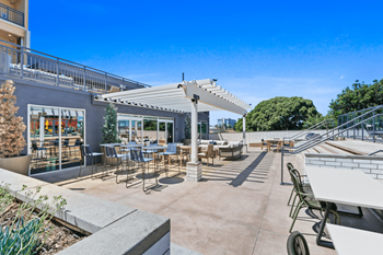 Ground terrace - second level outdoor lounge and bbq