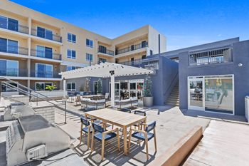 Ground terrace - second level outdoor lounge and bbq
