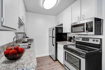Refrigerator (in select homes)